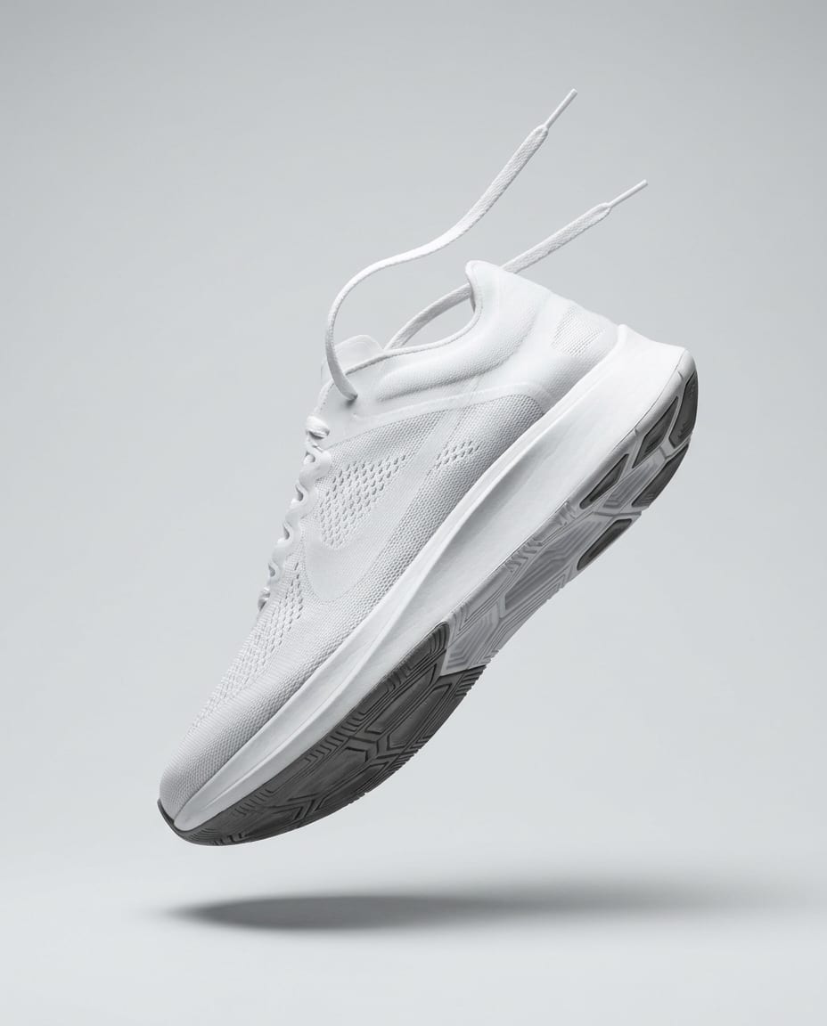 STRIDE sneaker campaign poster: a white sneaker with the headline Step into white.